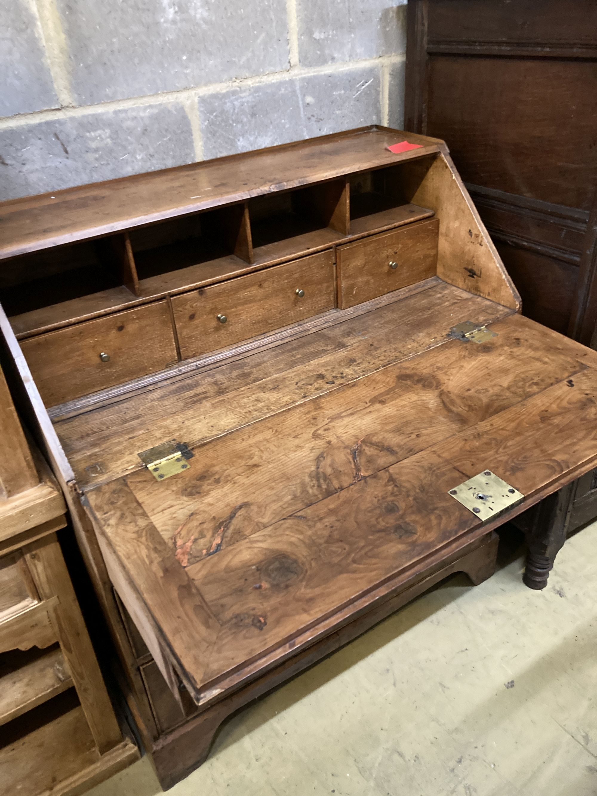 A George III provincial yew wood bureau, width 89cm, depth 48cm, height 101cm